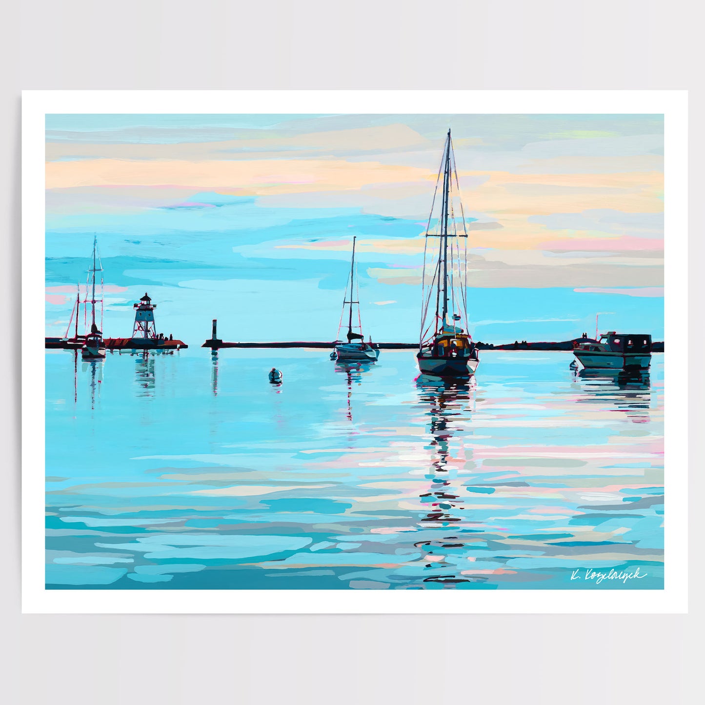A horizontal 14' x 11" art print depicting a calm Grand Marais, MN harbor scene with several sailboats and a lighthouse on reflective blue water under a pastel sky, shown with a white border on a light gray background. Artwork by Kristen Kozelouzek. 