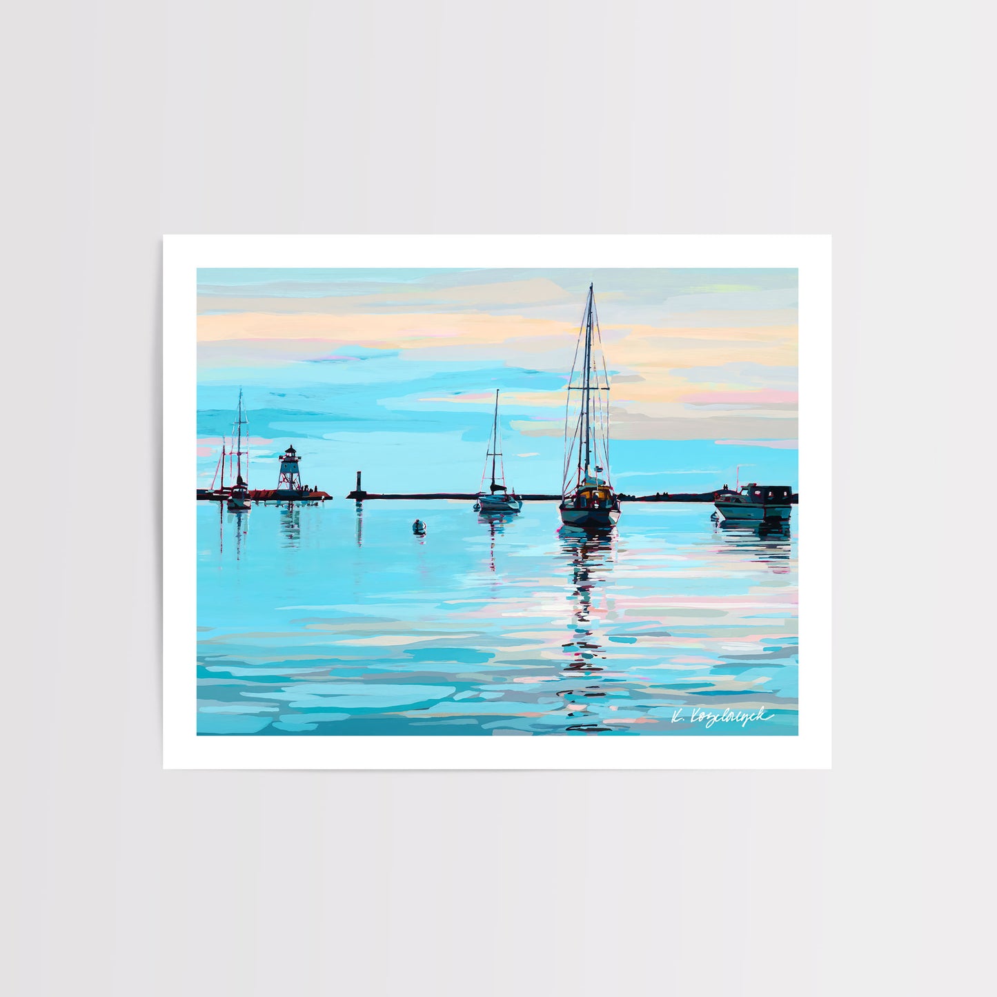 A horizontal 10" x 8" art print depicting a calm Grand Marais, MN harbor scene with several sailboats and a lighthouse on reflective blue water under a pastel sky, shown with a white border on a light gray background. Artwork by Kristen Kozelouzek. 